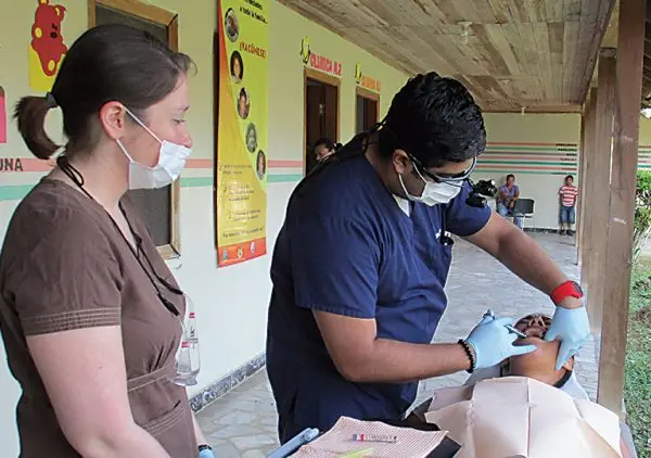 Image of Dr. Rishi Kapur working on a patient.